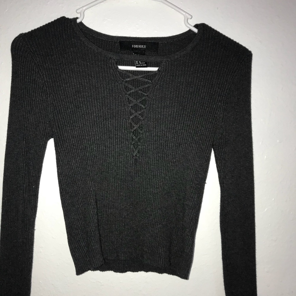 A dark gray long sleeve shirt